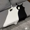 Vestidos casuais básicos Designer de verão Novo estilo minimalista Versátil fino e redutor de idade Bordado Regata de alça pequena Saia KRIC