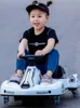Niños 12V Dual Drive Coches eléctricos Vehículos para niños Kart recargable Adultos pueden montar en carreras al aire libre Regalo del día de los niños