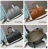 5A Femmes Hommes le sac fourre-tout sac de créateur Sacs à main de broderie de luxe 702242 Matelasse Cuir meilleure qualité Épaule femme hommes Sacs à main en cuir Taille 31x19x22CM