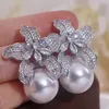 Stadnina elegancka imitacja Pearl Big Studs Kolczyki luksusowe błyszczące kryształowe kolczyki kwiatowe dla kobiet żeńska biżuteria na przyjęcie weselne 230612
