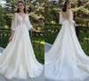 Délicat Dentelle Appliqued Col En V Plus La Taille Une Ligne Robes De Mariée Avec 3/4 Manches Longues Tulles Romantique Boho Jardin Robes De Mariée Sexy U Dos Nu Robes De Mariee CL2434