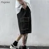 Herr shorts män sommar baggy chic ins mode casual japansk stil elastisk midja solida byxor design manliga harajuku kort 230612