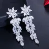 Dangle Oorbellen ThreeGraces Glanzende Zirconia Bloem Vormige Zilveren Kleur Lange Bungelende Drop Voor Bruiden Bruiloft Sieraden ER139