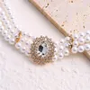 Girocollo Collana di perle a più fili di cristallo Collana di perle europee e americane esagerate corte vintage di lusso per le donne