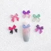 Decorazioni per nail art 30PCS Luce solare che cambia colore Charms con fiocco 3D Nastro glitter trasparente Bowknot Accessori per forniture Kawaii