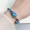 Strang Karloch Silberfarbenes China-Chic Flaming Blue Lucky Fish Lotus Armband handgewebt handdekoriert schlicht