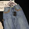 Women's Jeans Designer 2023 Summer New Commuting Versatile Fresh and Playful Combination Leather Tassel Edge Straight Leg NRVG