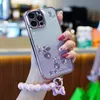 BLING Luxury Gradient Diamond Cases Handband Glitter handledskedja mjuk pläteringsblomma TPU Slim Camera Protective Cover för iPhone 14 13 12 11 Pro Max 8 7 Plus