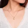 Подвесные ожерелья 2023 Медный материал, инкрустанный одной цирконом луной корейской версии модной девушки Heart Special Nearlac для женщин