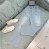 Jeans feminino designer de alta qualidade primavera/verão casual versátil cintura flor botão lavado calças jeans azul LFCK