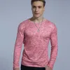 Printemps et automne nouveau T-shirt à manches longues pour hommes solide Lycra solide jeunesse hommes tendance de la personnalité