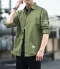 Camisas casuais masculinas 2023 Camisa masculina de manga comprida Primavera e outono Commuter Work Shirt Estampado com letras coreanas Gola polo de peito simples