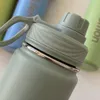 1pc مع شعار LU710ML Sports Water Bottles Stainless Steel Stains Pure Titanium Vacuum Portable Cups Outdible Cups KS613