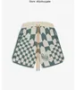 Rhude mäns shorts American High Street Sticked Hawaiian Flower Loose Cashew Flower Drawstring Woolen Green Mens and Women's Short