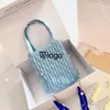 Bolsa feminina de verão nova Alice Pearl com corrente e design Sense bolsas de ombro plissadas de nicho