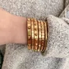 Imperméable à l'eau sans ternissement bijoux en acier inoxydable bijoux empilables 18k plaqué or bracelets jonc pour cadeau