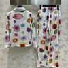Pijamas femininos de seda pijamas primavera verão design colorido divertido camisa estampada senhoras lapela solto uso em casa
