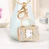 Keychains Fashion Ladies Gold Color Creative Square Handväska Form Keyring Big Crystal Stone Keychain White Rhinestone Car Bag Accessories