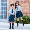 Conjuntos de Roupas Uniforme Estudantil Britânico Escola Primária Roupas de Jardim de Infância Camisa Terno de Verão Camisa Azul Marinho Saia Shorts para Crianças Meninos Meninas 230612