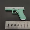 Metallo G17 pistola pistola 1: 3 giocattoli modello con 6 proiettili espulsione guscio sopravvivenza pistola ornamenti in miniatura alta simulazione equipaggiamento soldato staccabile 2112