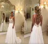 2023 Cheap Beach Dresses Lace Appliqued V Neck A Line Sexy Backless Boho Wedding Dress Sweep Train Custom Garden Bridal Gowns