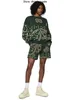 Rhude mäns shorts American High Street Sticked Hawaiian Flower Loose Cashew Flower Drawstring Woolen Green Mens and Women's Short