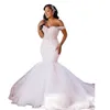 Splendidi abiti da sposa a sirena africana Appliques in pizzo con spalle scoperte Corsetto Abiti da sposa avorio Collo a cuore senza maniche Lungo Plus Size Robe De Mariee