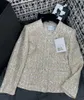 女性用ジャケットデザイナーデザイン2023 Spring/Suer New Ampagne Beaded Fabric Fashion Versatile Short Coat ojxi