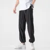 Pantaloni da uomo Uomo Street Hip Hop Stripe Casual Loose Summer Fashion Trend Pant Pantaloni comodi di alta qualità con coulisse