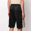 Мужские шорты дизайнерские роскошные дизайнерские мужские модные летние брюки расслабленные короткие повседневные брюки-карго Pantalon длиной до колена Tech Fleece Swim AM9U