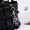 Portachiavi Evil Blue Eye Palms Shape Charm Hand Bag Ciondolo Portachiavi Supporto per auto per donna Uomo Gioielli Portachiavi Regalo classico