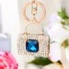 Keychains Fashion Ladies Gold Color Creative Square Handväska Form Keyring Big Crystal Stone Keychain White Rhinestone Car Bag Accessories