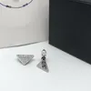 デザイナージュエリーヨーロッパとアメリカンダイヤモンドデザインP逆三角形の女性ネックレスイヤリングセット新しいファッション気質フリンジイン