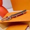 Porte-clés de marque Skateboard en acier inoxydable Creative conçu porte-clés marron noir pendentif accessoires avec boîte 949A262E166x