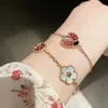 Catena Trend Marchio di vendita europeo Bracciale in oro rosa Donna Bianco Fritillaria Fiore fortunato Primavera Gioielli di lusso 230613