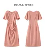 2023 été rose couleur unie robe à manches courtes col rond midi robes décontractées W3L041104