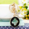 Nyckelringar Vackra Fourleaf Clover Keychain Utsökt metall Fashion Car Pendant Key Ring Women039S Bag Charm Gift792275226x