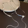 Tour de cou léger luxe perle Triangle tirant gland collier pour femmes Simple à la mode collier chaîne personnalisé exquis