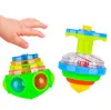 UFO blinkande snurrande toppbarn Gyro Light Up Toy Kids Piggy Led Music GyroScope Launcher Rotating Toys Fun Birthday Party Favors