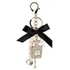 2021 Ny imitation Pearl Perfym Bottle Keychain Car Ring Holder Bag Charm Pendant Accessories Bow Key Chain Fashion Keyring303530274U