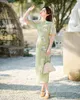 Vêtements ethniques chinois traditionnel classique vert imprimé fleuri Qipao femmes longue haute fendue Cheongsam robe de soirée