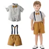 Chemise en coton rayée à manches courtes pour garçons d'été, short à bretelles pour hommes, ensemble deux pièces de vêtements pour enfants à la mode enfants 2023