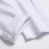 新しいホワイト刺繍韓国版デザイナースリムフィットジーンズファッションブランド壊れた穴エラスティック汎用ハイウエストハーランストリートパンツ