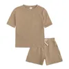 Kläder sätter sommar väsentliga trackdräkt barnkläder set kostym för flickor kort ärm topshorts pojkar kostym barn kläder sportkläder 230613