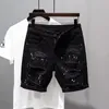 Męskie dżinsy Summer perforowane cienkie dżinsowe spodenki czarne, swobodne mycie Slimable Five Point Middle Pants Boy's Loose