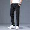 Pantalones para hombre, verano 2023, tela de seda helada suave, pantalones finos informales de estilo coreano a la moda para hombre, pantalones rectos de alta elasticidad, marca masculina