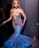 Sky Blue Mermaid Aso Ebi Prom Dresses Sheer Neck Gillter Pärlade paljetter Black Girl Par Ootd Ruffles Train Evening Gown