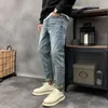 Jeans da uomo Primavera Vintage Marchio di moda da uomo Slim Fit Pantaloni lunghi Allentato Rilassato Versatile Piccoli piedi Ritagliati Alla moda