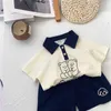 Polo pour garçons à manches courtes 2023 été nouveau ours pour enfants beau deux pièces bébé vêtements