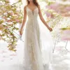 Abito da donna elegante con ricami da sposa Abito da sera senza schienale floreale in pizzo sexy Abito da sposa bianco con cinturino per spaghetti